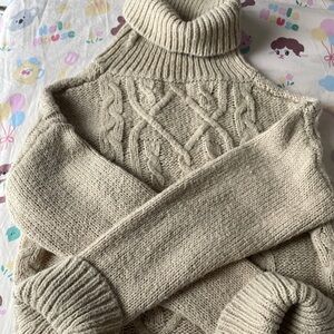 Woolen turtleneck sweater